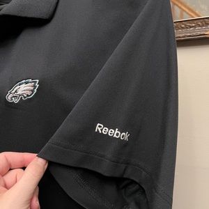 Used Reebok 2 XL Philadelphia Eagles Black Polo in great condition.